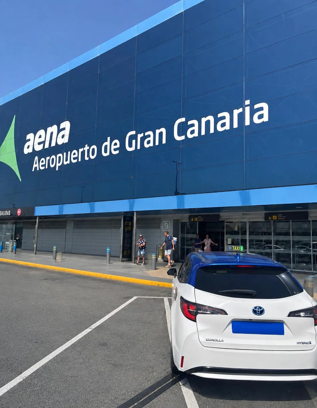 The taxi parked outside the Gran Canaria Airport terminal